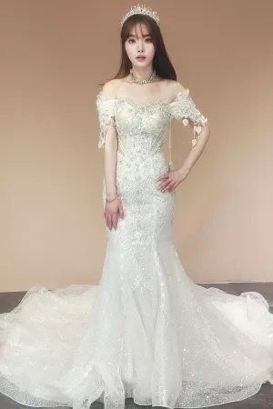 intricate beading and lace applique wedding dress