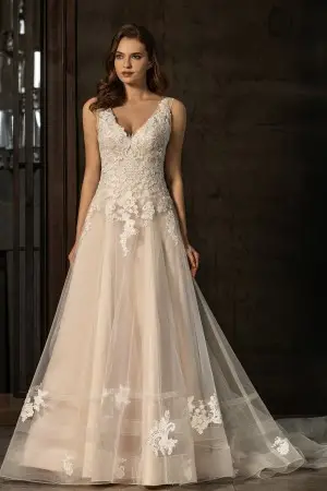 Elaborate embroidered lace pink nude wedding dress