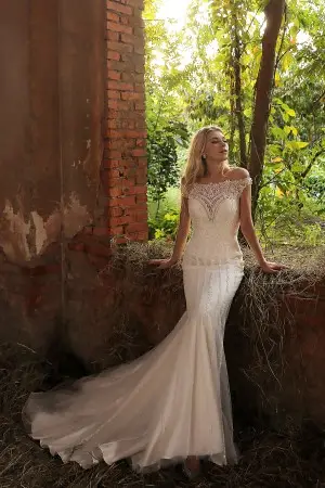 elegant off the shoulder beaded mermaid bridal gown