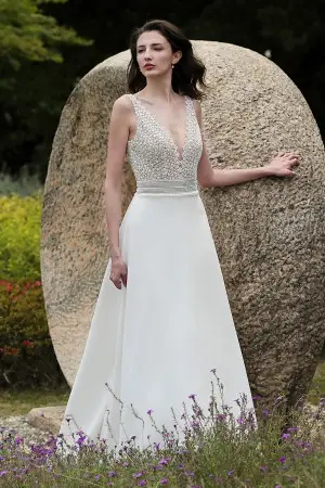 feminine V neckline lace and crepe designer wedding dress