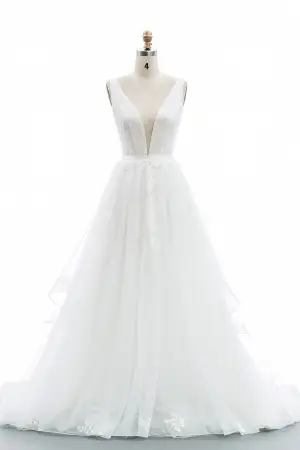 plunging V neckline and V back ivory tulle bridal gown